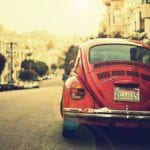 lifestyle_red-ww-car-on-street_274K[1]