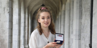 Two gold medals awarded by NUI Galway for civic engagement galway daily news nui galway gold medal lisa o'neill