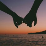 pexels-valentin-antonucci-1378723 romance holding hands