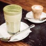 Hot matcha green tea latte cup