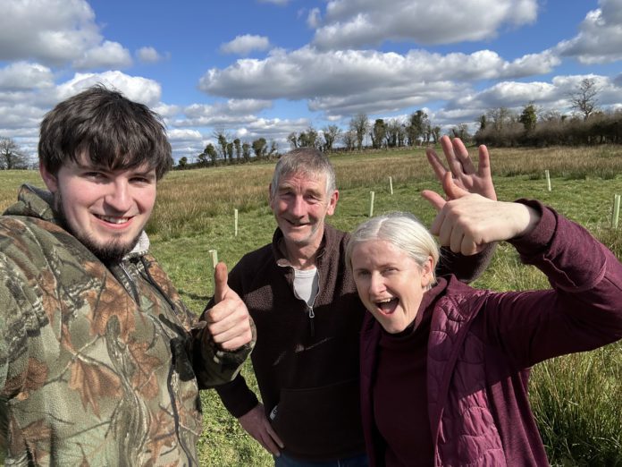 Kate Flood, her husband Hamish Brown and friend Timothy Sullivan (on left) on their farm in Co Meath